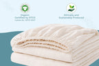 Baby crib sheets set of two folded and stacked