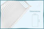 Baby crib sheets in soft white organic cotton on crib mattress Organic cotton fitted crib sheet close-up showing percale weave