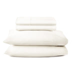 500 TC sateen bed sheets in offwhite on made bed